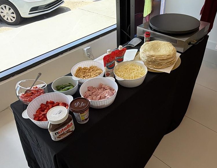 Crepe station with sweet and savory toppings